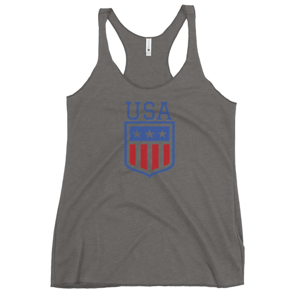 Retro USA Ladies' Racerback TankTankRetro USA Ladies' Racerback TankThis racerback tank is soft, lightweight, and form-fitting with a flattering cut and raw edge seams for an edgy touch. • 50% polyester, 25% combed ring-spun cotton, 25% rayon • Fabric wei