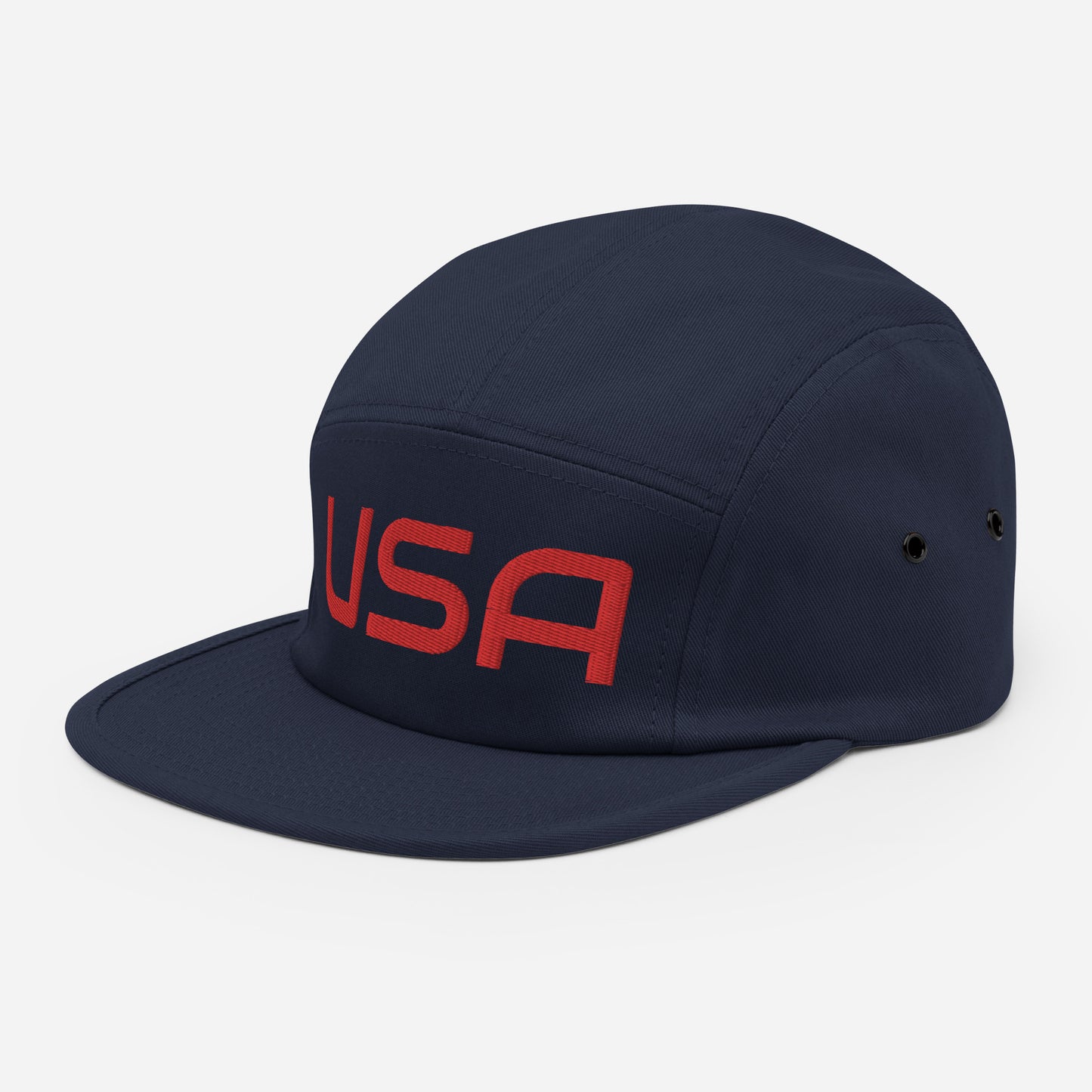 USA Camp HatHatUSA Camp HatThis camper style cap has a low profile and nylon strap clip closure. Comfortable and classic! • 100% cotton • Soft-structured • Five panel • Low profile • Metal eyelets • Nylon strap clip closure This product is made especially