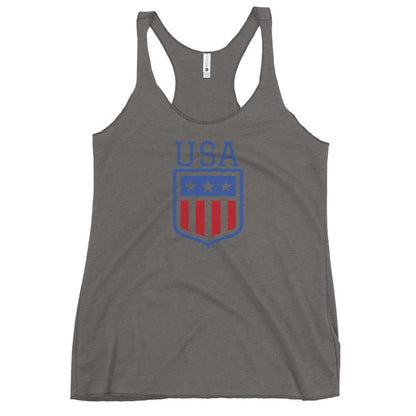 Retro USA Ladies' Racerback TankTankRetro USA Ladies' Racerback TankThis racerback tank is soft, lightweight, and form-fitting with a flattering cut and raw edge seams for an edgy touch. • 50% polyester, 25% combed ring-spun cotton, 25% rayon • Fabric wei