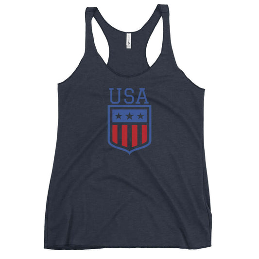 Retro USA Ladies' Racerback TankTankRetro USA Ladies' Racerback TankThis racerback tank is soft, lightweight, and form-fitting with a flattering cut and raw edge seams for an edgy touch. • 50% polyester, 25% combed ring-spun cotton, 25% rayon • Fabric wei